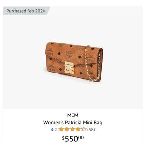 Stunning 2024 MCM $550 clutch bag with gold chain